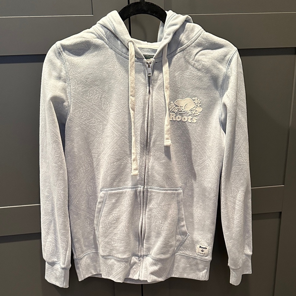 Roots Hoodie. Soft Blue with a White  Paisley Print. Size small.